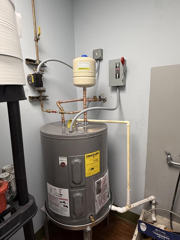 Electric water heater installed with a new expansion tank, recirculation pump and copper piping